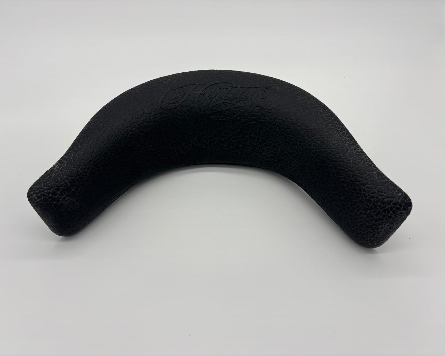 Black Heritage spa headrest designed for neck jet seating with flat‑top profile and centre mounting lug